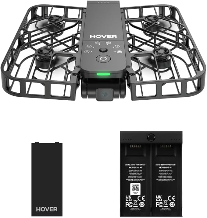 Compact black Hover drone with protective cage and batteries, ideal for aerial photography and videography