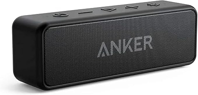 Black Anker portable Bluetooth speaker with control buttons on top for wireless audio streaming