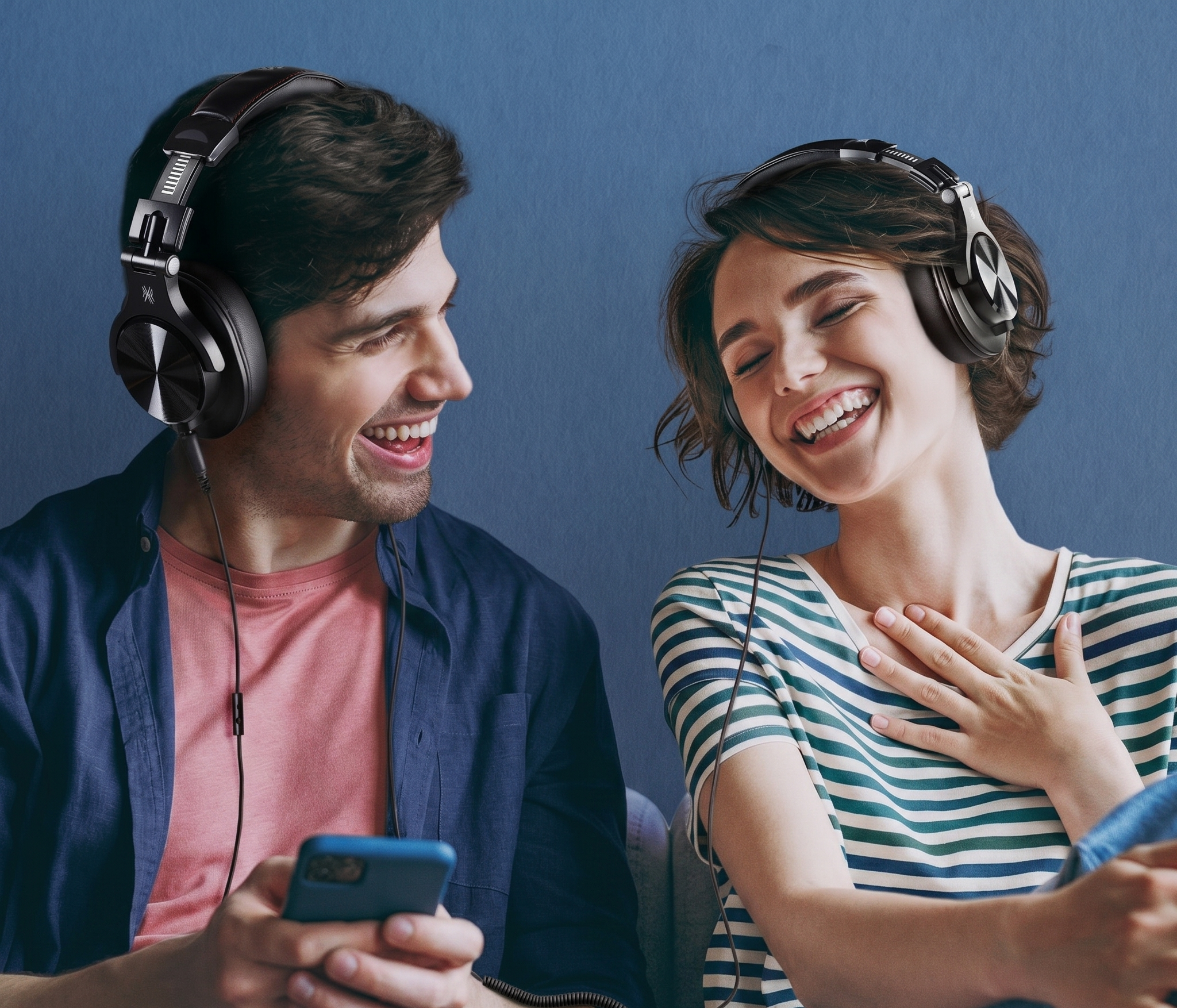 Couple enjoying music together with headphones, smiling and sharing a joyful moment while using a smartphone