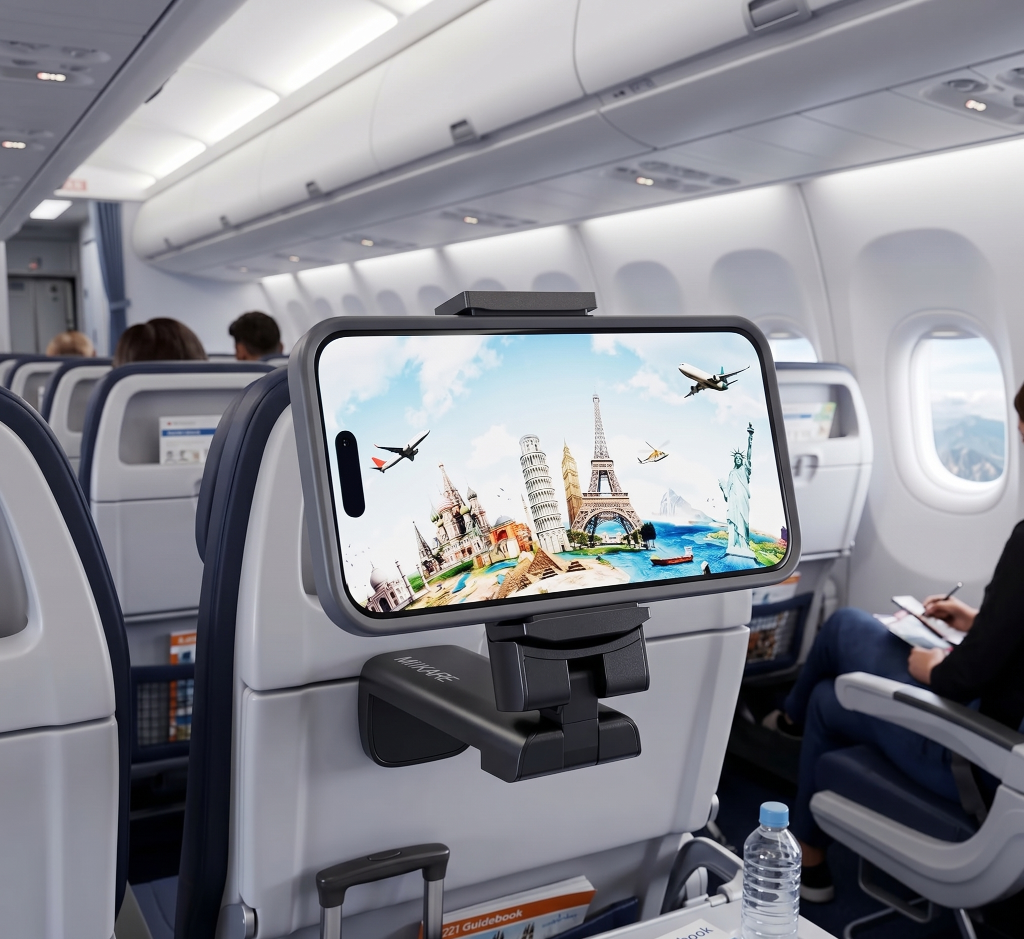 Phone holder on airplane seatback displaying famous landmarks, enhancing traveller's in-flight experience